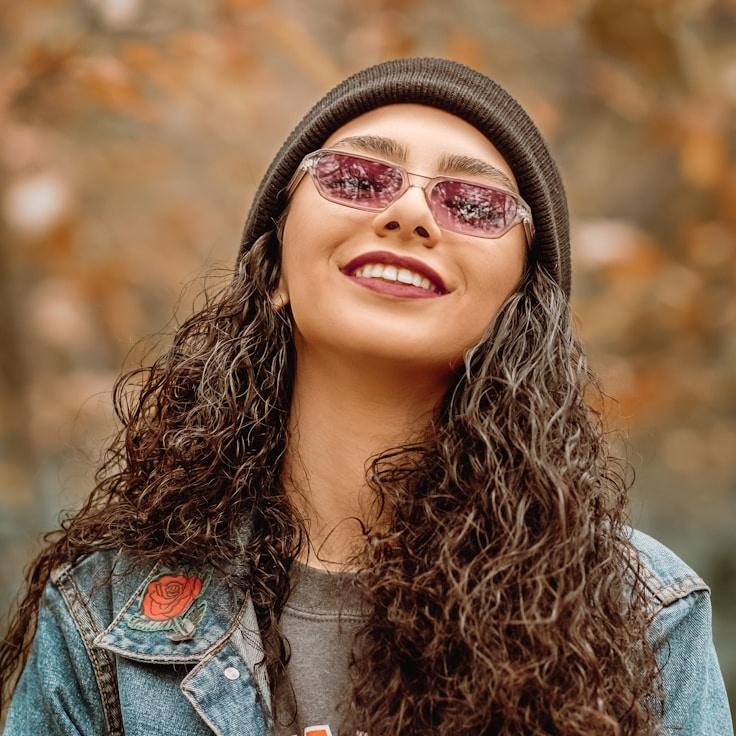 Aarav Singh, Lead Design Curator at OceanMirrorBlue, reviewing corporate floral arrangements